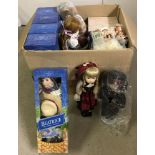 A box of assorted porcelain collectors dolls, many in as new condition.