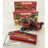 A boxed 1986 Kenner Parker Toys "Mask" Vampire #37400 toy.