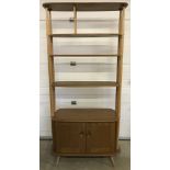 A mid century blonde Ercol Librenza / Room divider bookcase.