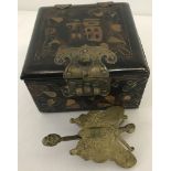 A vintage Chinese lacquer box with brass inlay and brass Chinese Butterfly lock.