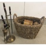 A woven raffia log basket.