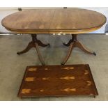 A modern maple veneer draw leaf oval dining table.