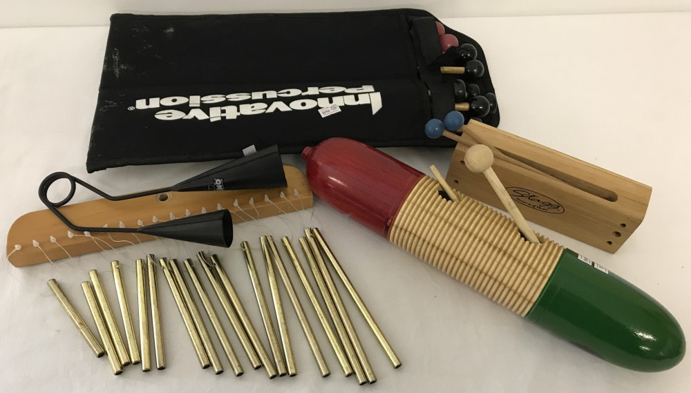 4 x percussion instruments with percussion mallets.