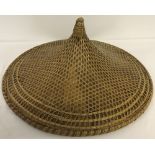 A vintage Asian Rice Hat (Coolie).