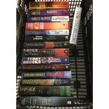 A box of 15 hardback thriller novels.
