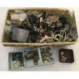 A basket of assorted vintage costume jewellery.