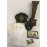 A collection of misc. assorted items to include treen items and linen.