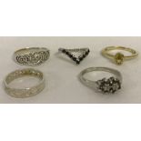 5 x silver rings of different designs.