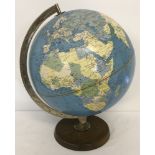 A vintage paper covered globe on wooden stand.
