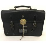 A RAF military leather briefcase with Mitchell Davey brass lock to front.