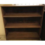 A vintage teak bookcase.