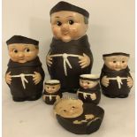 A set of 5 Goebels monk character jugs together with a spoon rest.