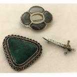 3 stone set vintage silver brooches.