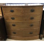 A Victorian 2 over 3 bow fronted chest of drawers with inlaid detail to top and draw fronts.