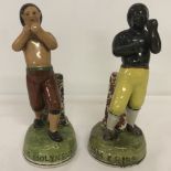 A pair of reproduction Staffordshire boxing figures; Tom Cribb and Tom Molyneux.