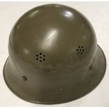 A Czechoslovakian Military tin helmet.