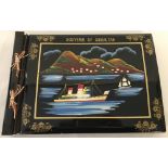 A c1950-60's black lacquer photo album 'Souvenir of Gibraltar'.