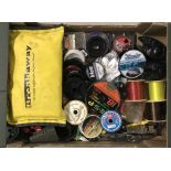A box of miscellaneous fishing equipment.