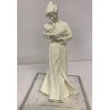 A Royal Worcester figurine from the Tender Moments range, "First Touch".