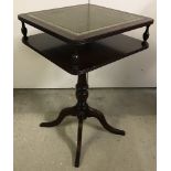 A reproduction dark wood square shaped occasional table with green leather insert to top.