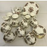 A quantity of Colclough tea ware with autumnal style pattern.