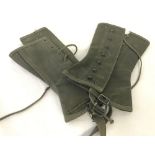 A pair of WWII pattern khaki canvas M1938 gaiters/leggings.