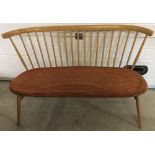 A mid century blonde Ercol elm 2 seater love seat.