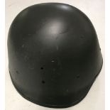 A grey Danish Military tin helmet.