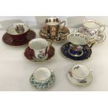 A collection of 7 Limoges and Copeland Spode cabinet cups and saucers.