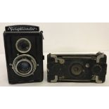 2 vintage cameras.