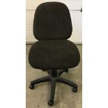 A modern black fabric seated office chair.