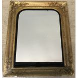 A Victorian gilt framed rectangular wall mirror.