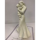 A Royal Worcester figurine from the Tender Moments range, "First Kiss".