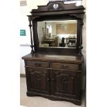 An Oak Art Nouveau dresser by Wallace King Ltd of Norwich.