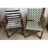 2 wooden framed directors chairs with fabric seats and backs.