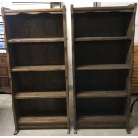 A pair of solid wood vintage dark wood 4 shelf bookcases.