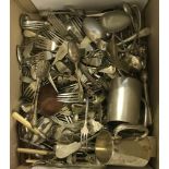 A box containing a very large quantity of flatware.