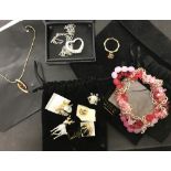 A collection of Oriflame costume jewellery with original packaging.