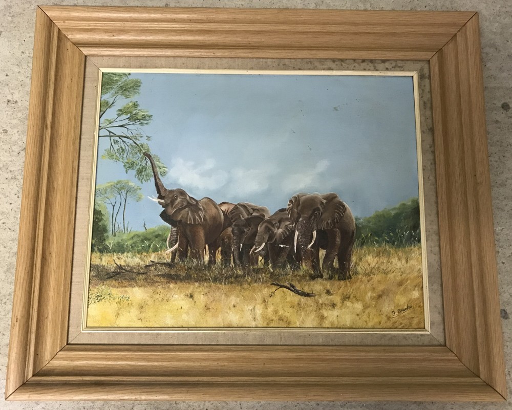 J. Brooks signed oil on board of elephants, framed.