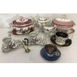 A collection of Continental ceramics to include lidded tureens, cups and saucers and chocolate cups.