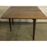 A Victorian mahogany fold out breakfast table with inlaid detail to top and sides.