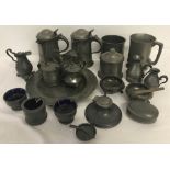 A collection of assorted vintage and antique pewter items.