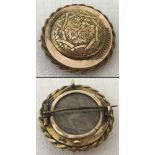 Victorian gold mourning brooch with compartment to the reverse with woven fair hair.