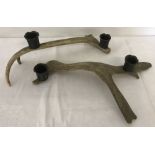 A pair of fallow horn candle holders.