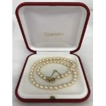 A boxed Majorica faux pearl necklace with 925 silver clasp.