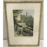 A framed and glazed coloured etching of a river side seller in Paris.
