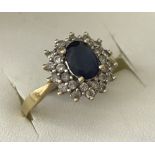 18ct gold sapphire & diamond cluster ring.