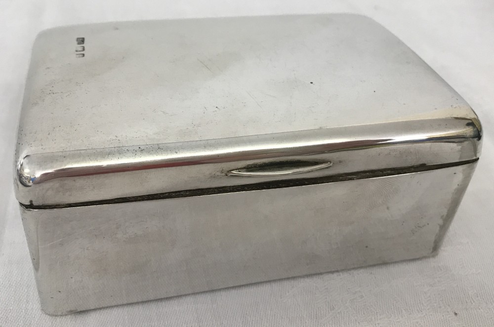 A silver trinket box hallmarked Birmingham 1901.