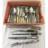 A tray of vintage silver plated cutlery to include sets of "Christofle" forks and serving spoons.