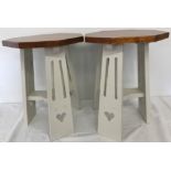 A pair of cream painted Art Deco style side tables.